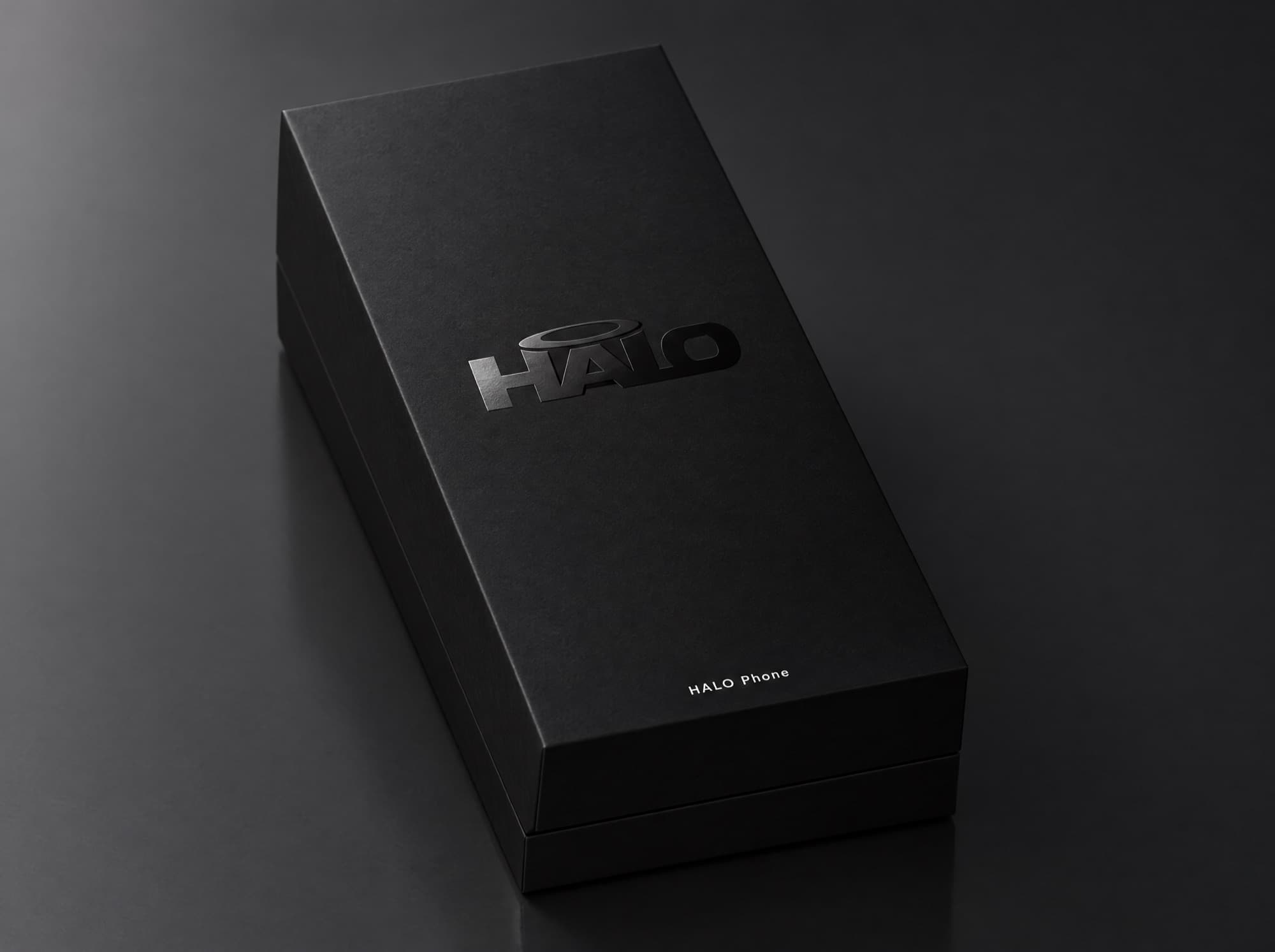 The HALO Phone box: matte black, with the HALO mark in a soft gloss on the lid
